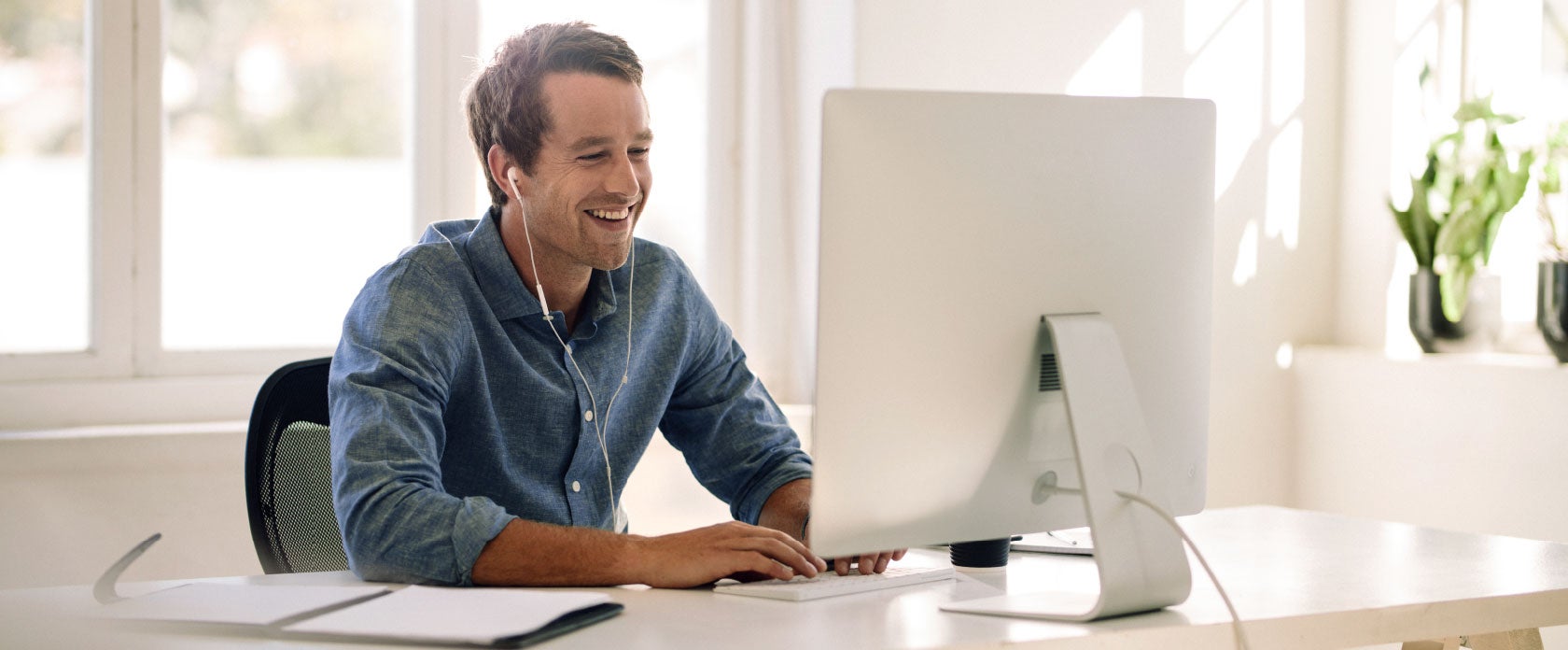Man working on desktop computer