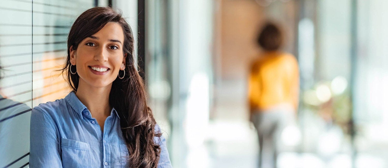 woman standing smiling at rice university applications are open for computer science courses 2022