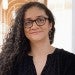 Paola Cascante-Bonilla stands outside in a cooridor on the Rice University campus