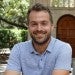 Anastasios Kyrillidis sits outside on the Rice University campus